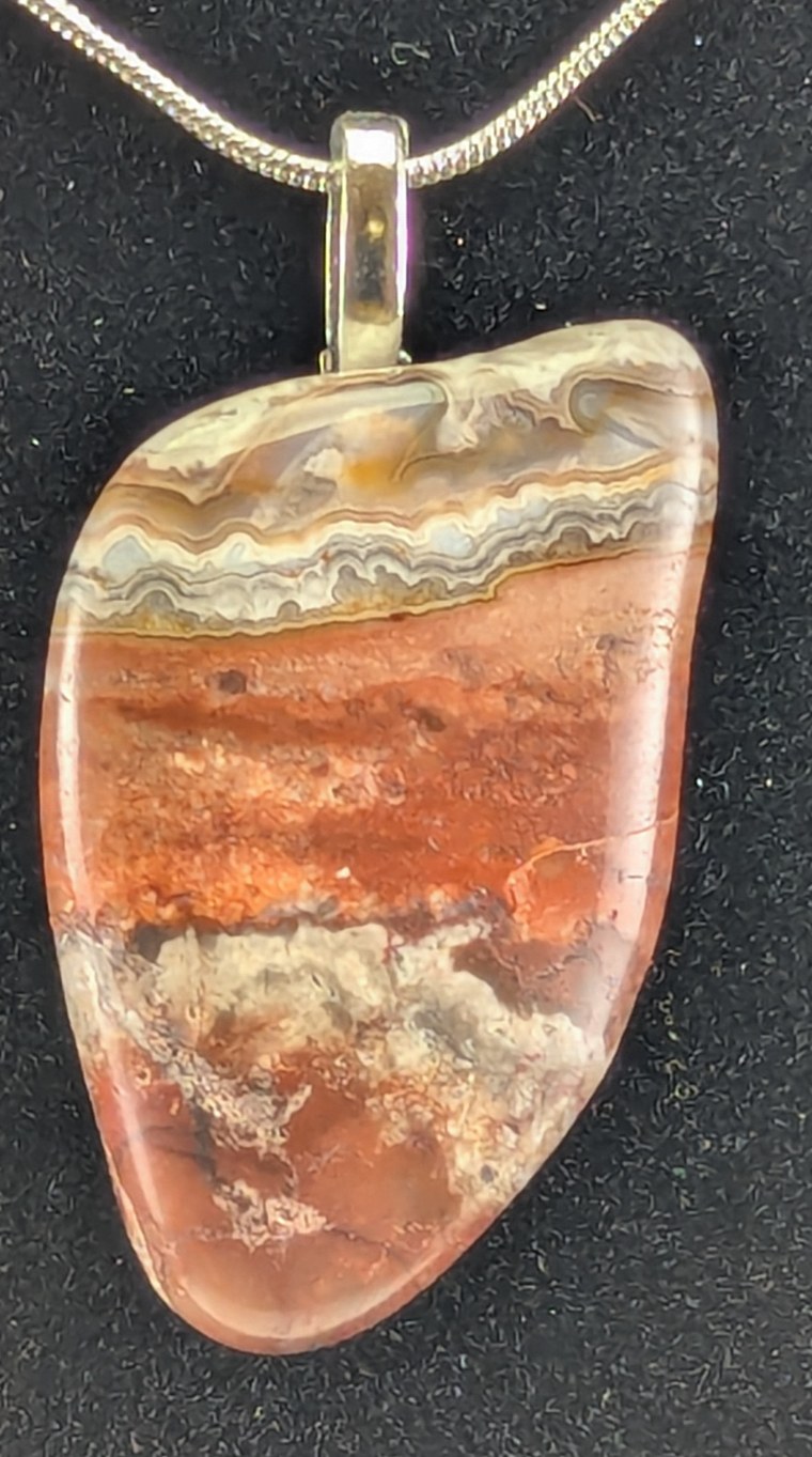 Crazy lace agate pendant on a silver chain