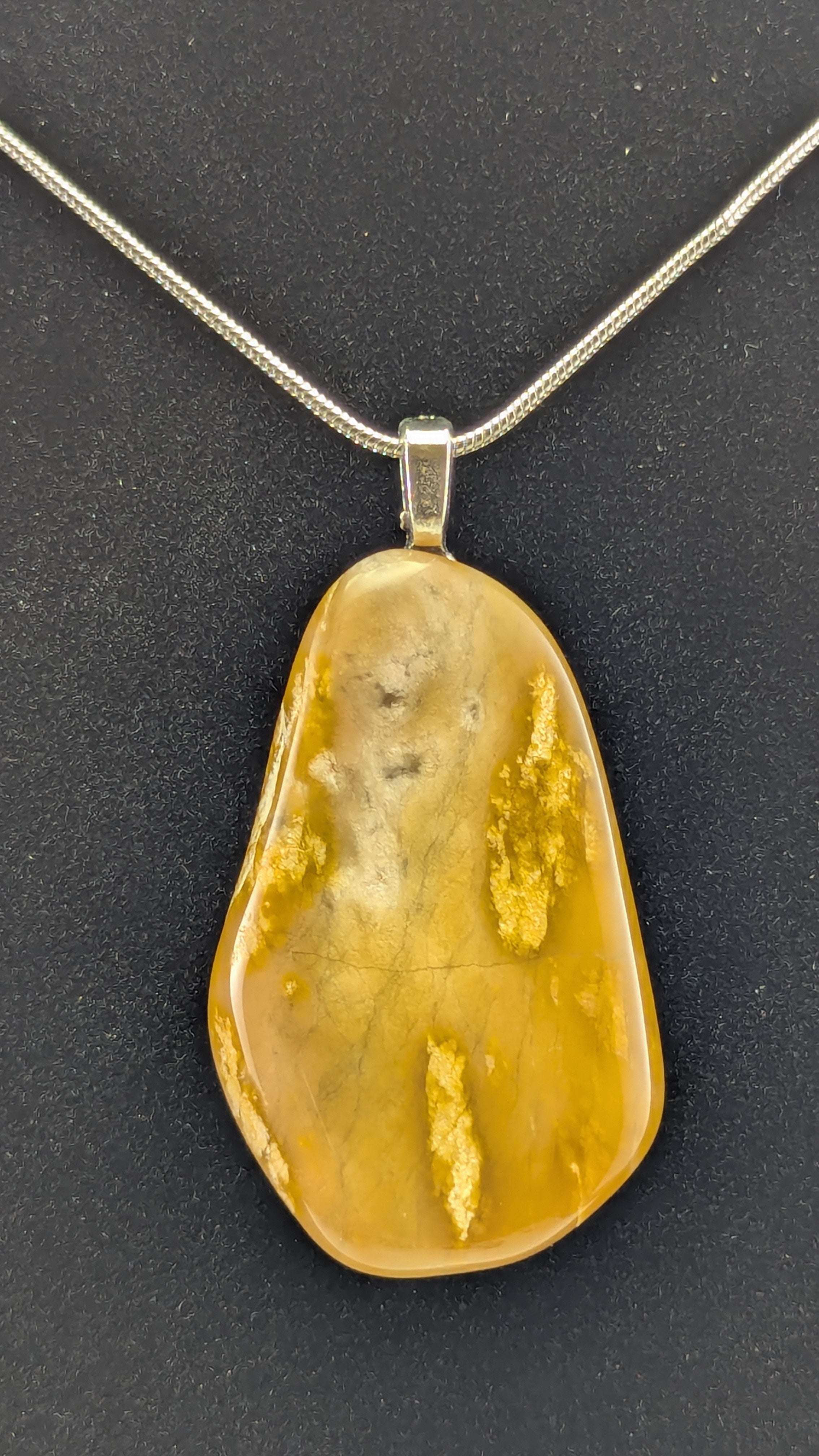 Elegant Yellow Jasper Pendant with Quartz Windows